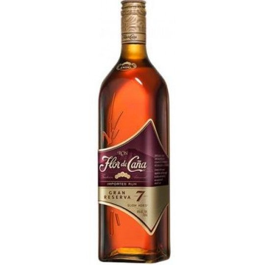 Paramount Flor de Caña Grand Reserve 7 Year Old dark rum in 700ml bottle with label and packaging visible.
