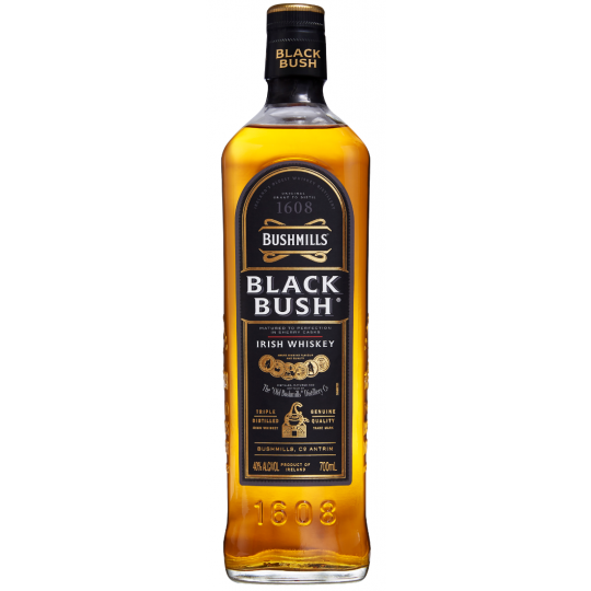 Bushmills Black Bush Irish Whiskey 700ml bottle with dark label and cork cap, displayed on a wooden surface.