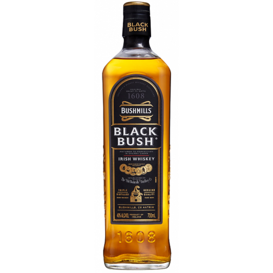Bushmills Black Bush Irish Whiskey 700ml bottle with dark label and gold accents, displayed on a wooden surface