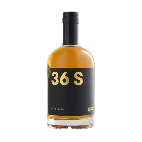 Bottle of Paramount 36 Short Gold Rakia flavored gin, 500ml, with golden label and clear glass showcasing the product.