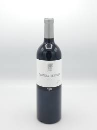 Bottle of Chateau Teyssier 1er Grand Cru Classe wine by Paramount, 750ml, with elegant label and deep red color.