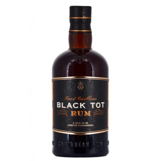 Black Tot Finest Caribbean Rum 700ml bottle from Alba Whisky, with dark label and rich amber color in a glass bottle.