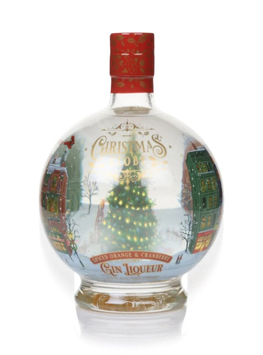 Christmas snow globe featuring a light-up scene with spiced orange and cranberry gin liqueur in a 700ml bottle.