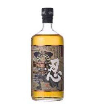 JQWS Shinobu Pure Malt Whisky bottle, 700mL with a dark label and gold accents, displayed on a wooden surface.