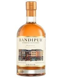 Bottle of LiquorDay Bandipur Nepalese Blended Whiskey with label visible, showcasing rich amber color and distinctive branding.