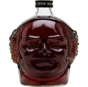 Dark Rum Old Monk Legend 700mL bottle from LiquorDay, showcasing the rich, dark-colored liquor in a clear glass bottle.