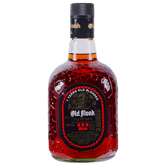 Bottle of Old Monk Dark Rum in 700mL bottle from LiquorDay, featuring the classic dark rum packaging and label.