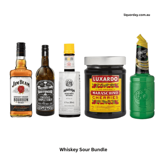 Whiskey Sour Bundle from LiquorDay featuring bottles of whiskey, sour mix, and cocktail tools for making whiskey sours at home