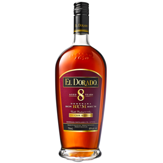 A bottle of LiquorDay El Dorado aged 8 years Demerara Rum with a dark label and gold accents, shown on a wooden surface.