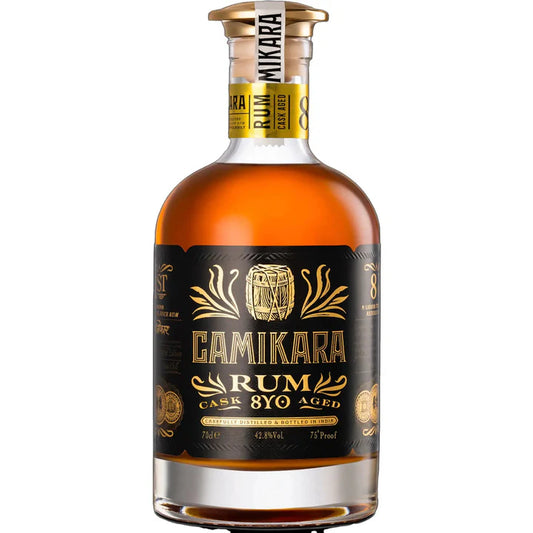 A 700ml bottle of Indri Camikara Aged 8 Years Limited Edition Rum by LiquorDay, with a dark amber liquid in a decorative bottle.