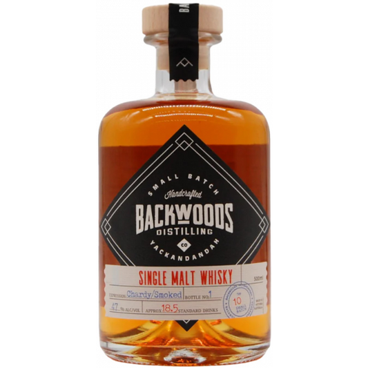 Backwoods Single Malt Batch 10 whisky by LiquorDay, with ex-Chardonnay cask aging and smoked red finish, in a glass.