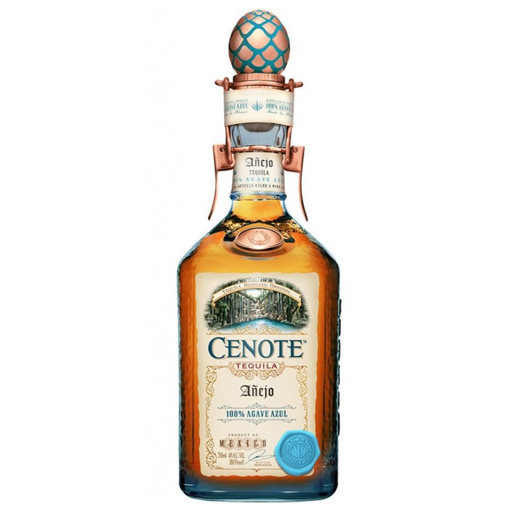 Bottle of Paramount Cenote Anejo Tequila 700mL with amber liquid and decorative label, showcasing premium añejo tequila.