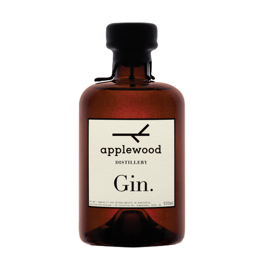 Bottle of Paramount Applewood Distillery Australian Dry Gin in a 500ml clear glass bottle with a label featuring botanical illustrations.