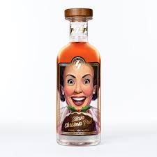 Australian dry gin bottle labeled Little Juniper Eileen's Christmas Pud, 700ml, from Paramount, featuring festive packaging.
