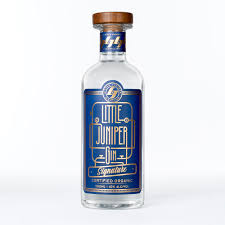 Australian dry gin bottle labeled Little Juniper Signature Gin by Paramount, 700ml size, with a sleek design and clear branding.