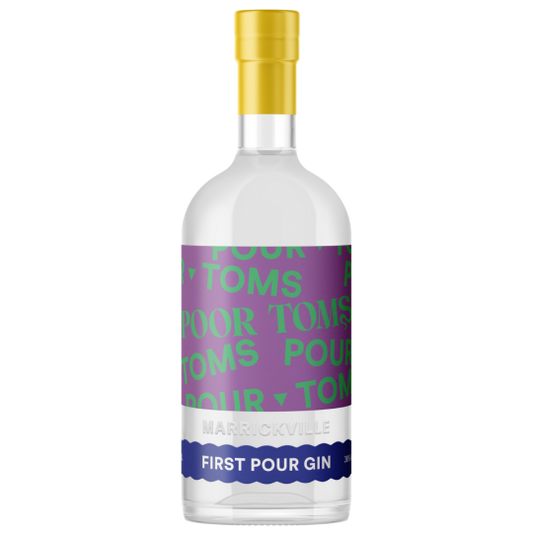 Australian dry gin bottle labeled Poor Toms First Pour Gin by Paramount, 700ml size, with clear glass and label details