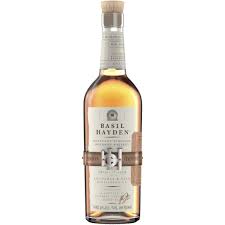 Basil Hayden's Red Wine bourbon in a 750ml bottle, produced by Paramount, with a rich amber color and distinctive label.
