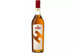 Paramount Hine Cognac H by 700ml bottle with amber liquid in a clear glass bottle, detailed label visible.