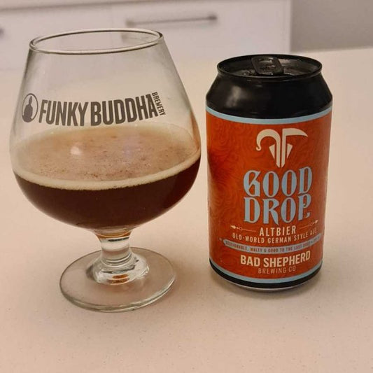 Sixteen 355ml cans of Bad Shepherd Good Drop Altbier craft beer by Paramount, featuring the beer's label and packaging.