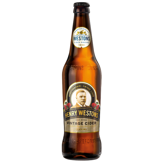 Pack of 12 Westons Henry Westons Vintage craft ciders in 500ml bottles by Paramount, displayed in a retail setting.