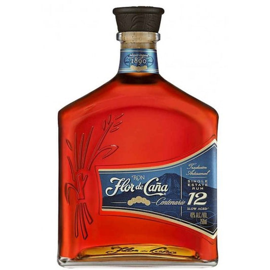 Paramount Flor de Caña Centenario 12 Year Old Dark Rum 700ml bottle with label and dark glass bottle.