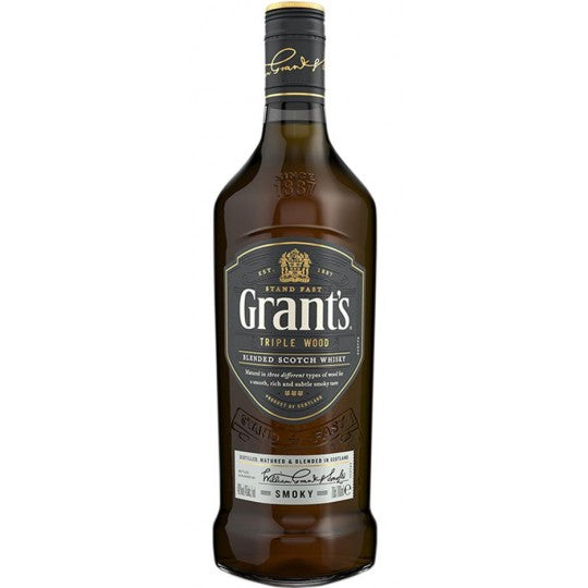 Grant's Triple Wood Scotch Whisky 700ml bottle with label, showcasing the Paramount brand and rich amber color.