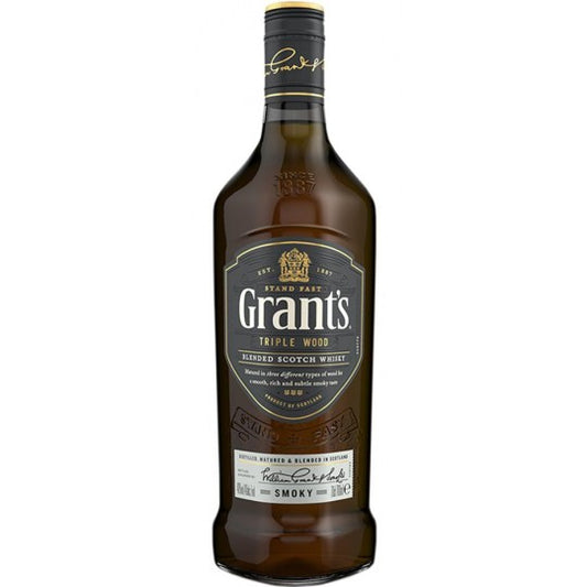 Grant's Triple Wood Scotch Whisky 700ml bottle with label, showcasing the Paramount brand and rich amber color.