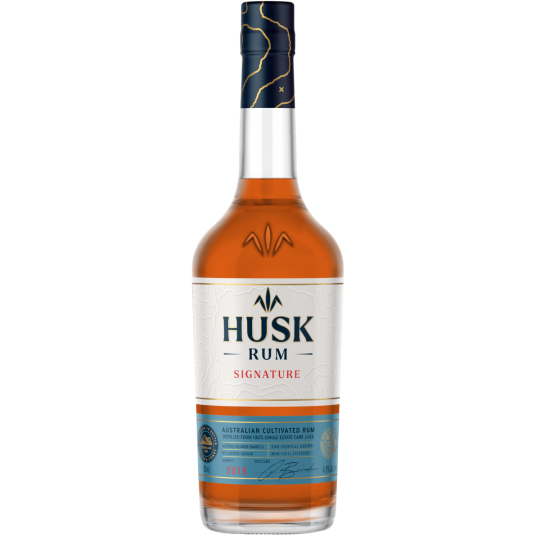 Paramount Husk Signature Australian Cultivated Rum 700ml bottle with label and clear glass, highlighting the premium liquor packaging