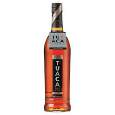 Paramount Tuaca flavored liqueur bottle, 700mL, with a clear glass bottle and colorful label showcasing the premium liqueur.