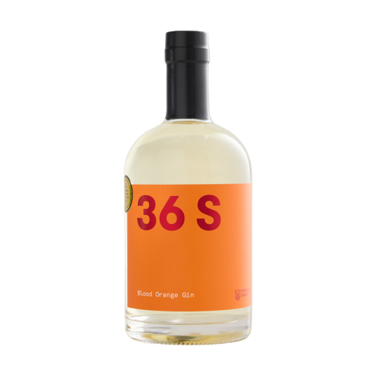 Bottle of Paramount 36 Short Blood Orange Flavoured Gin 500ml with vibrant orange label and clear glass bottle.