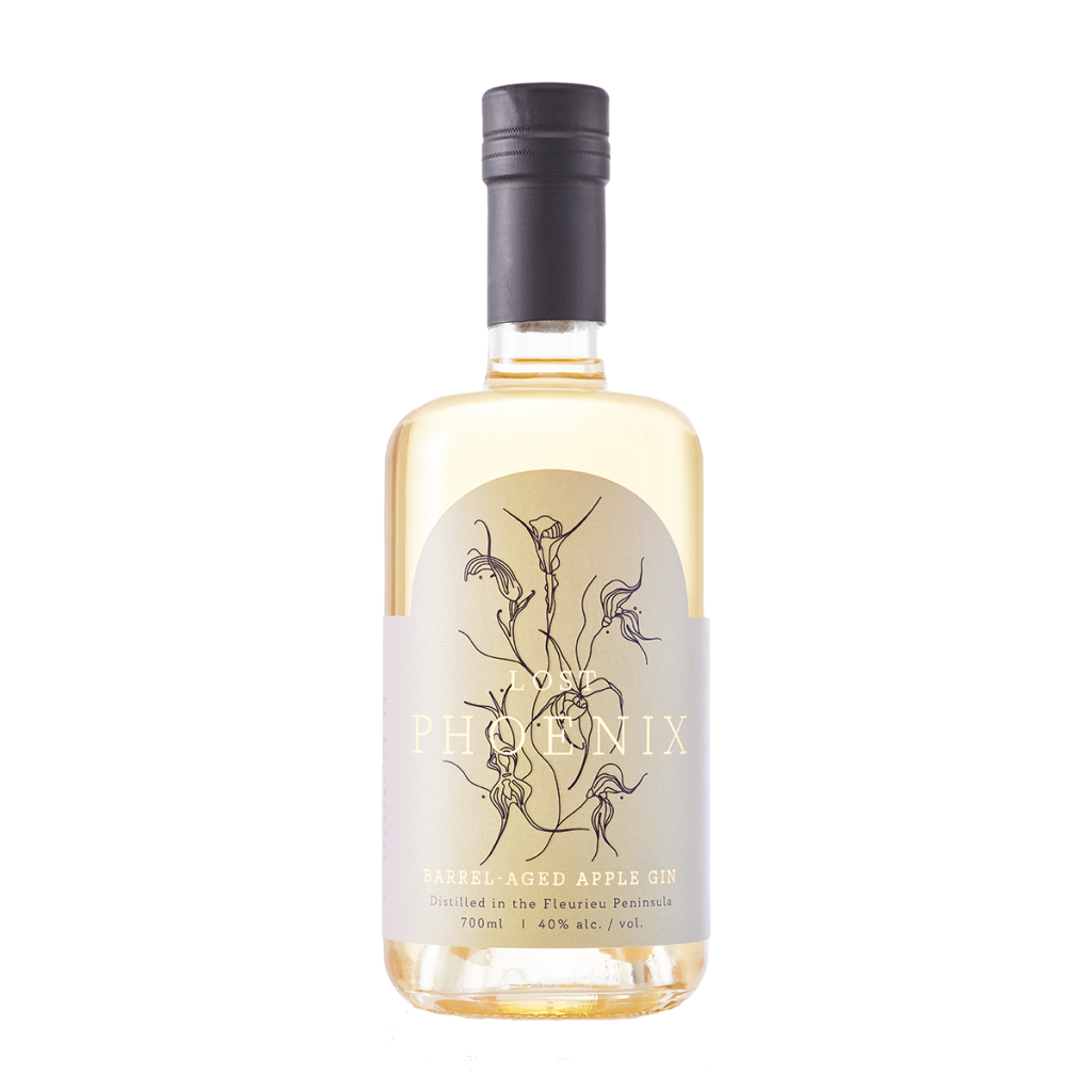 Paramount Lost Phoenix Spirits Barrel Aged Apple Gin 700ml bottle, showcasing the label and rich amber color of this flavored gin.