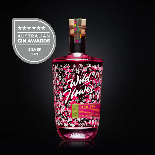 Paramount Wildflower Pink Gin 700mL, a flavored gin with a vibrant pink hue and floral wildflower infusion, in a glass bottle.