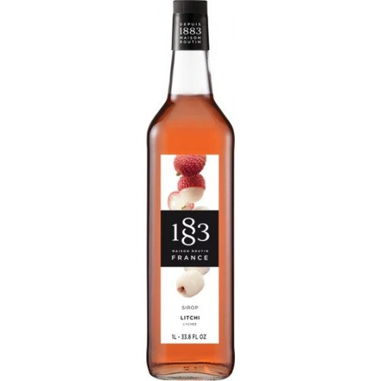 Paramount 1883 Lychee Flavored Syrup 1L bottle with vibrant label and clear liquid inside.