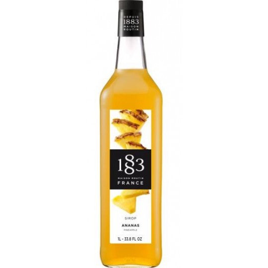 Paramount 1883 Pineapple Flavored Syrup 1Lt bottle with bright yellow pineapple illustration and clear label.