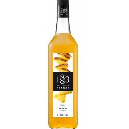 Paramount 1883 Pineapple Flavored Syrup 1Lt bottle with bright yellow pineapple illustration and clear label.