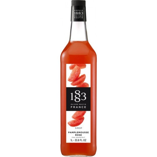 Paramount 1883 Pink Grapefruit Flavored Syrup in a 1-liter bottle, vibrant pink liquid with a citrusy appearance.