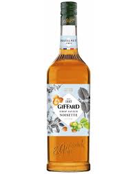 Giffard Hazelnut Syrup 1L by Paramount, a flavored syrup with rich hazelnut aroma and dark amber color.