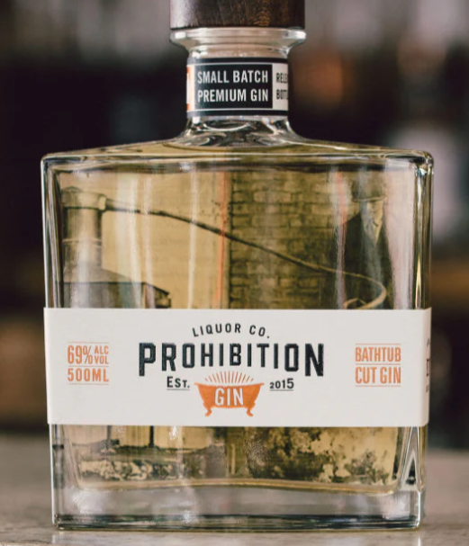 Bottle of Paramount Prohibition Liquor Co. Bathtub Cut Navy Strength Gin, 500ml, with label and navy-themed design.