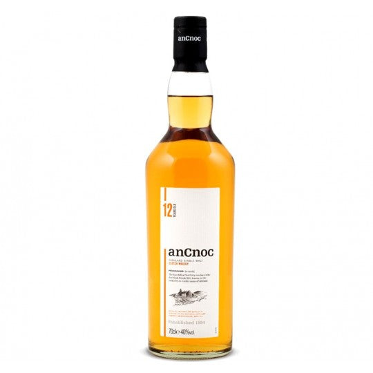 anCnoc 12 Year Old Scotch Whisky single malt bottle from Paramount, 700mL, with a dark label and elegant packaging.