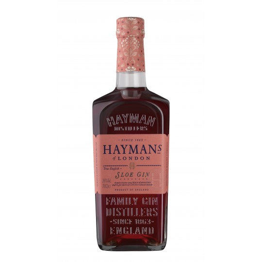 Bottle of Hayman's Sloe Gin by Paramount, 700mL, with a dark purple liquid and label featuring gin branding and floral accents.