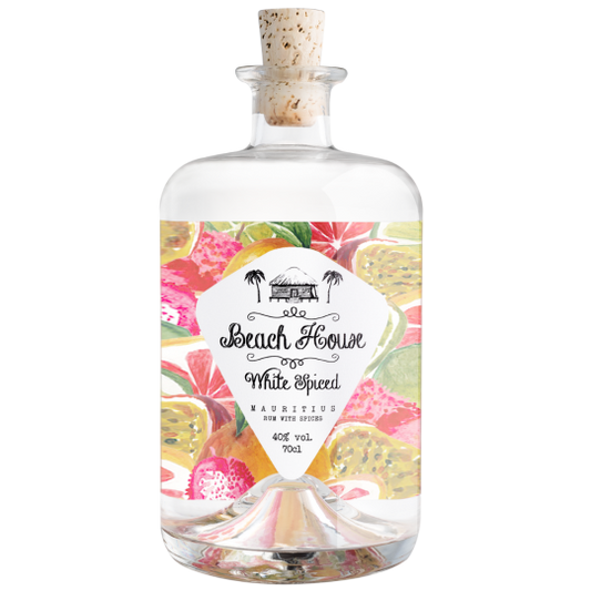 Paramount Beach House White Spiced Rum bottle with passionfruit, lychee, and green lime flavors in a 700ml bottle.