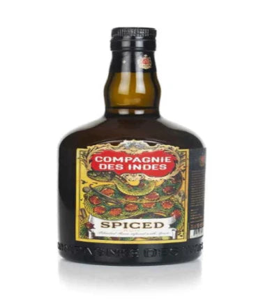 Paramount Compagnie Des Indes Spiced Rum 700mL bottle with label and dark amber liquid, showcasing the spiced rum in a glass.