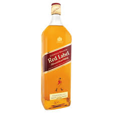 Johnnie Walker Red Label 1.125L spirits bottle from Paramount with distinctive label and red stripe design.