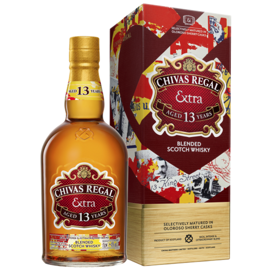Paramount Chivas Regal Extra Blended Scotch Whisky 700mL bottle with gold and green label and elegant glass decanter