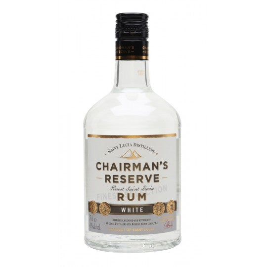 Paramount Chairman's Reserve White Label Rum 700ml bottle, clear glass with white label and gold accents, on a wooden surface.