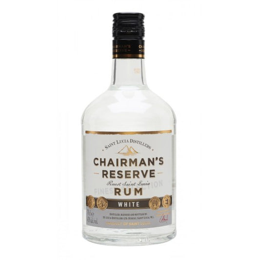 Paramount Chairman's Reserve White Label Rum 700ml bottle, clear glass with white label and gold accents, on a wooden surface.
