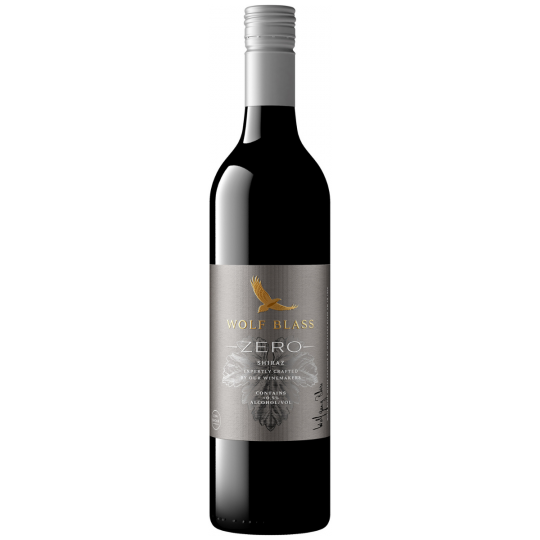 Bottle of Wolf Blass Zero Alcohol Shiraz wine by Paramount, 750ml, with dark red wine visible in the glass.
