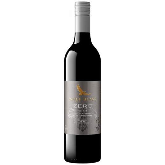 Bottle of Wolf Blass Zero Alcohol Shiraz wine by Paramount, 750ml, with dark red wine visible in the glass.