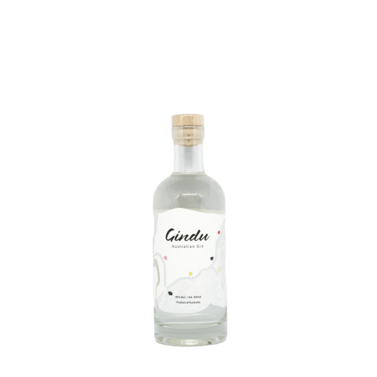 Bottle of Giniversity Sriracha Australian Gin by The Spirits Company, 500ml, with vibrant label and clear glass showcasing the gin inside.